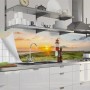 Küchenrückwandfolie mit Leuchtturm Sylt Motiv in Küche über Spüle.