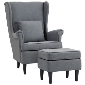 Grauer HOMCOM Ohrensessel mit Hocker und Lendenkissen im Wohnzimmer.