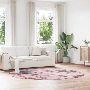 Runder Altrosa Shaggy Hochflorteppich NAVARRA aus Polyester, 240x240 cm, auf hellem Holzfußboden im Wohnzimmer.