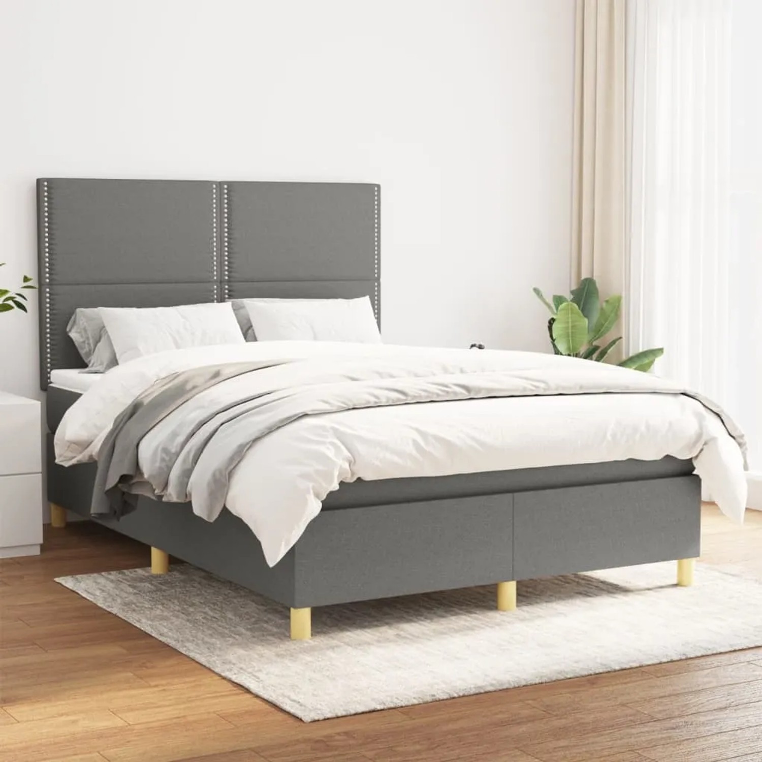 Dunkelgraues vidaXL Boxspringbett (140x190 cm) mit Matratze und Stoffbezug.
