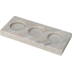 Sandfarbener Teelichthalter aus Marmor mit drei Mulden für Teelichter.