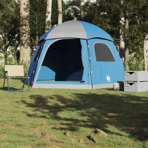 Blaues Iglu Familienzelt für 6 Personen mit Campingstuhl und Aufbewahrungsboxen.