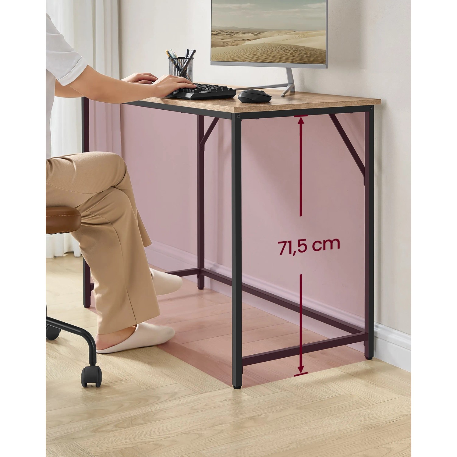 Vasagle Schreibtisch (100x76x50 cm) in Braun-Schwarz mit Person am Computer und Höhenangabe.