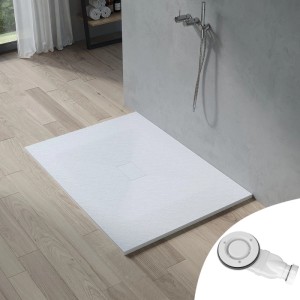 Rechteckige, weiße Aquabatos Duschwanne 140x100 cm in Steinoptik mit Ablaufgarnitur im Badezimmer.