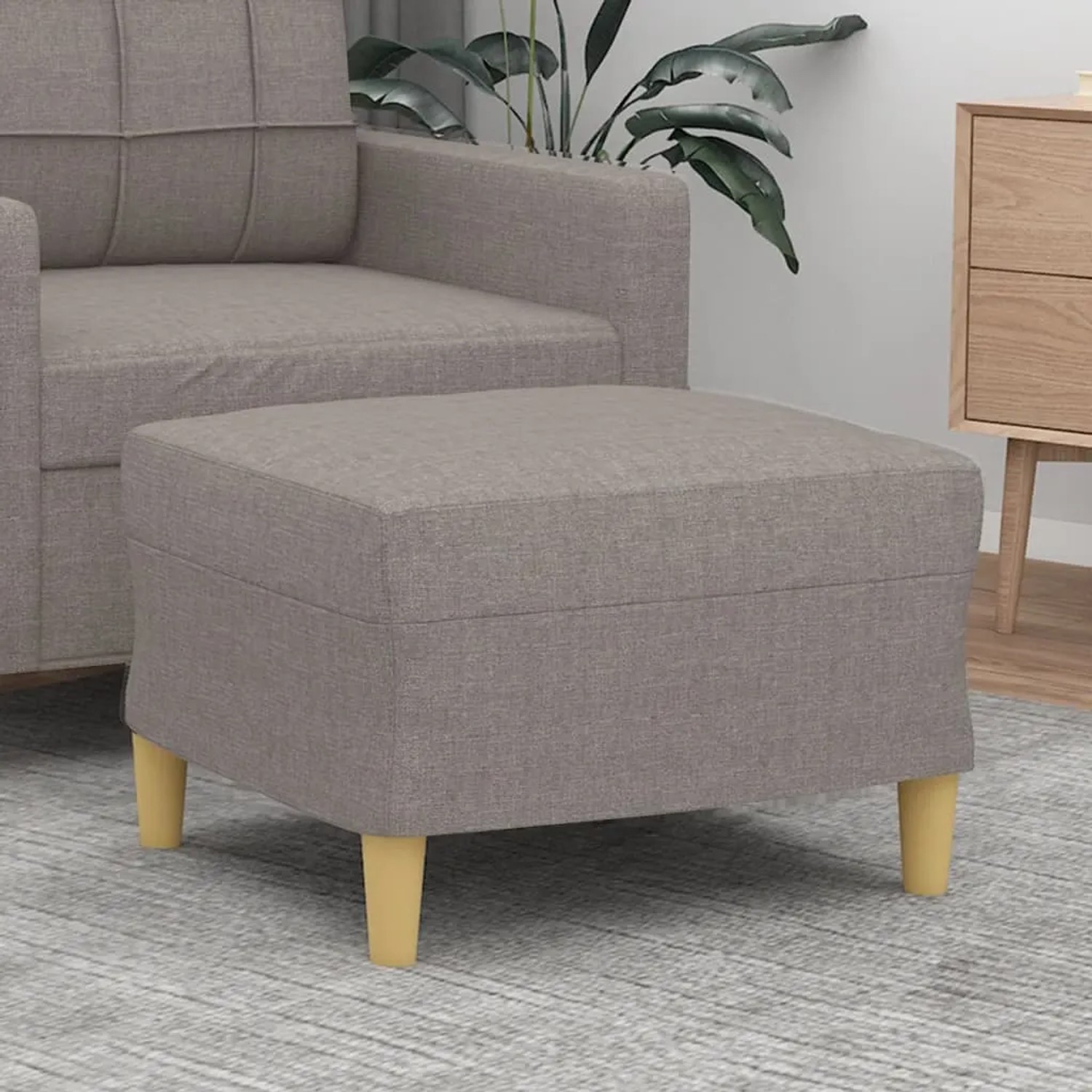 Quadratischer, taupefarbener vidaXL Fußhocker aus Stoff mit Holzfüßen.