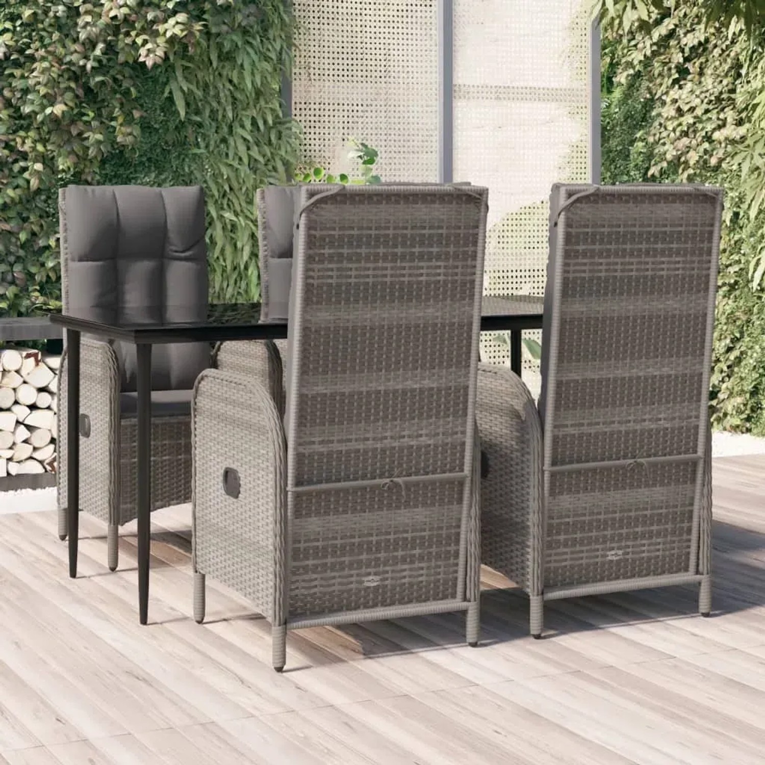 5-tlg. Garten-Essgruppe aus Poly Rattan in Schwarz/Grau mit Tisch und verstellbaren Stühlen mit Kissen.