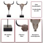 Dekorative Standfigur Kuhschädel aus Polyresin mit filigranem Tribal-Muster auf schwarzem Fuß.