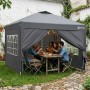 Grauer Sekey Faltpavillon 3x3m mit Seitenteilen im Garten. Wasserdichtes Pop Up Partyzelt schützt Gäste bei Feier im Freien.
