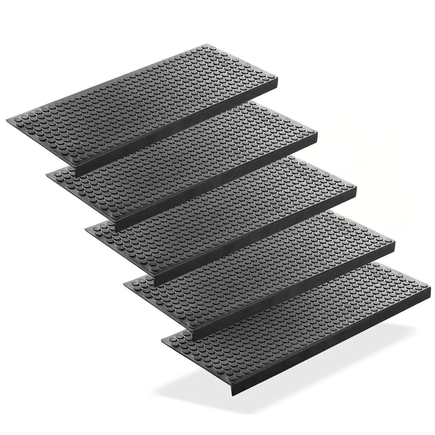 Fünf schwarze Gummi Stufenmatten mit Anti-Rutsch Kreisdesign für sichere Treppen im Innen- und Außenbereich.