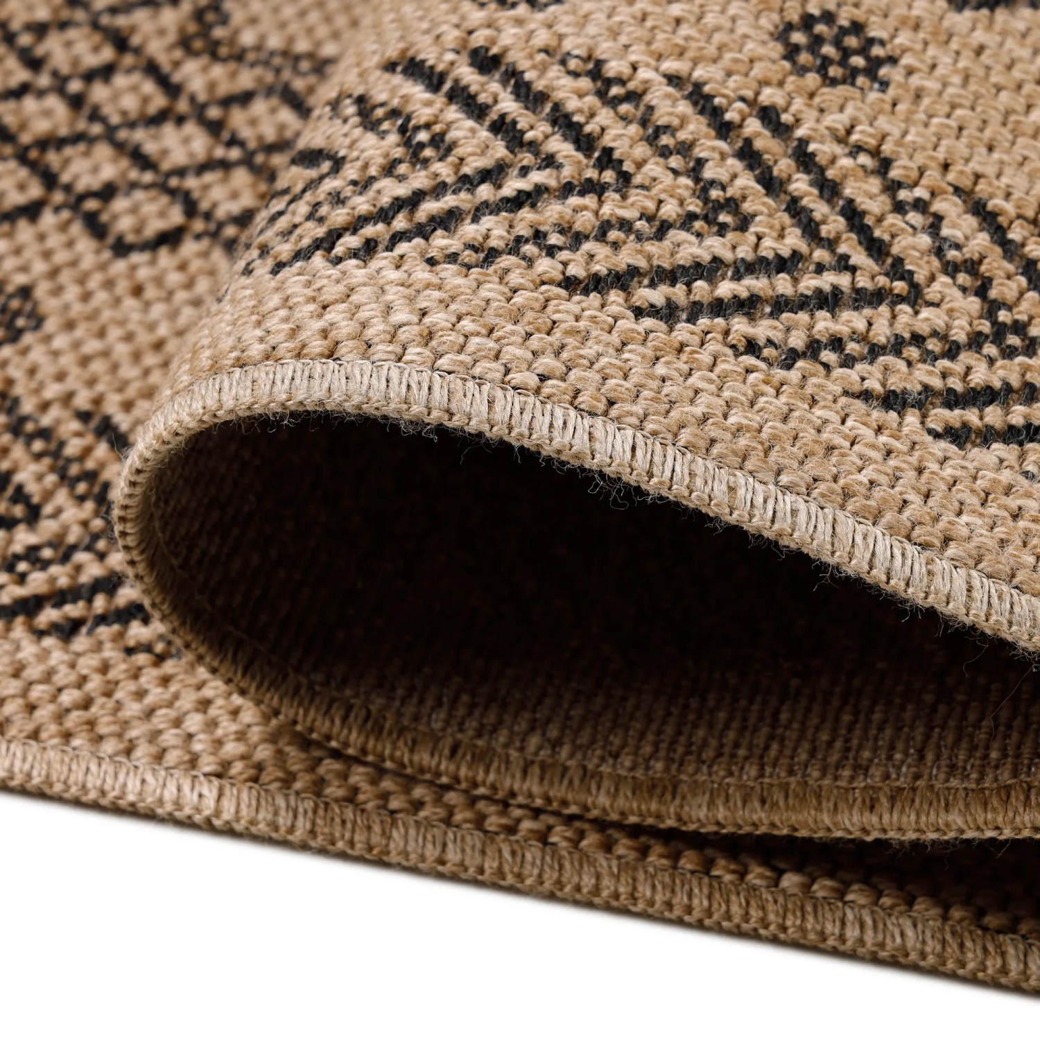 Detailansicht: Ayyildiz Outdoor-Teppich Dhaka, 80x150 cm, schwarz mit Vintage-Muster.