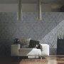 Graue Vliestapete Elegance 3 mit Ornament-Muster im Wohnraum.