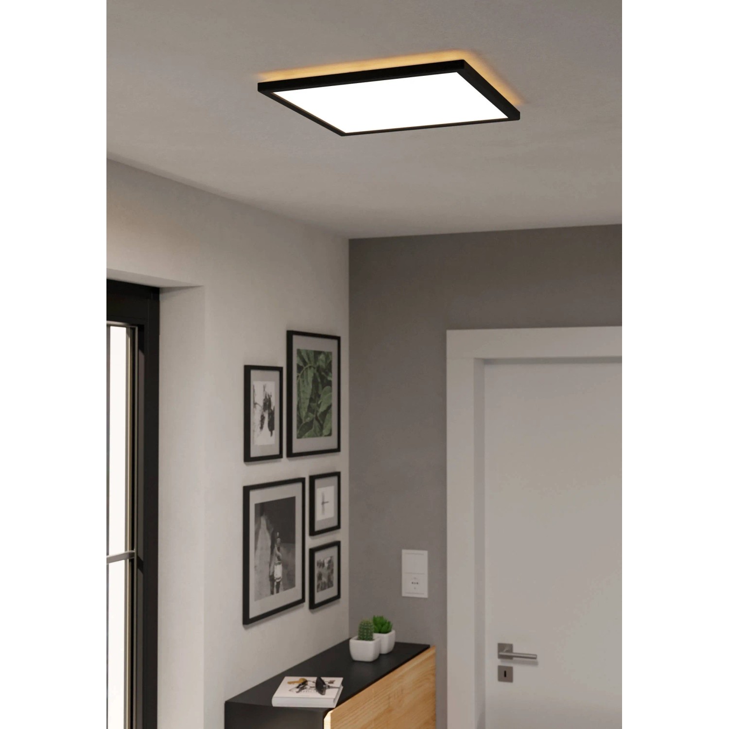 Quadratische, schwarze LED-Deckenleuchte Rovito von Eglo mit weißer Leuchtfläche. Moderne Deckenlampe für Wohnräume.