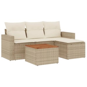 Beige 5-tlg. Garten-Sofagarnitur aus Rattan mit Kissen und Tisch mit Akazienholzplatte.