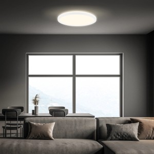 Weiße, runde Brilo LED Deckenleuchte Panel Slim im Wohnraum mit indirektem Licht.